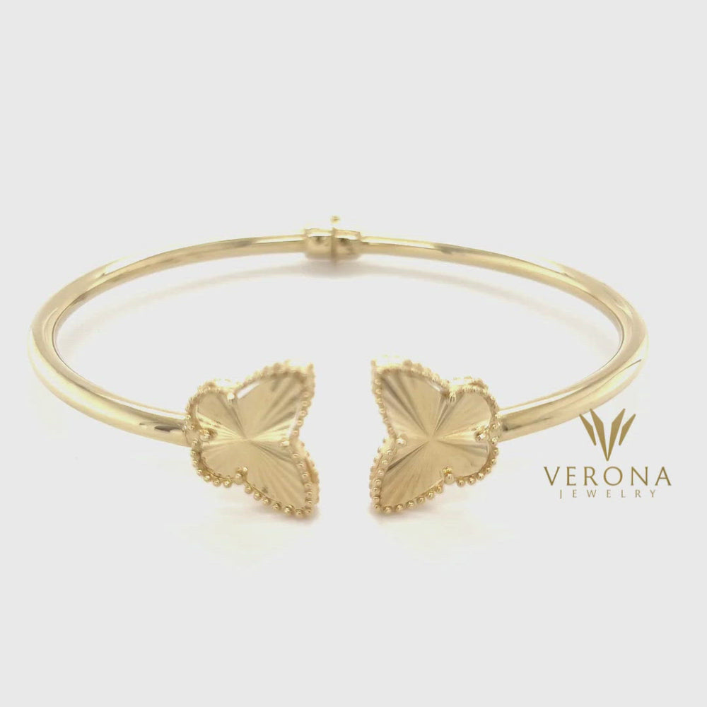
                  
                    Load and play video in Gallery viewer, 14Kt Gold Mariposa Bangle
                  
                